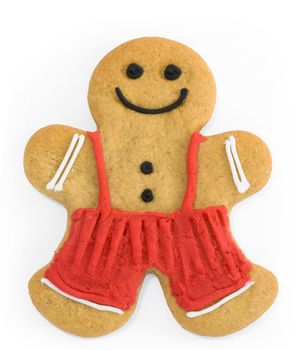 Smiling gingerbread man with dungarees and buttons