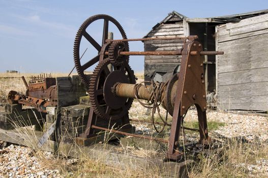 An old fishermans winch on the beach