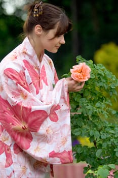 Girl in a pink yukata with rose

