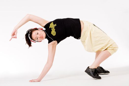 Young girl enjoying the music and dance on it