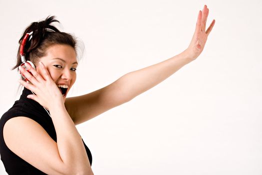 Young girl enjoying the music and dance on it