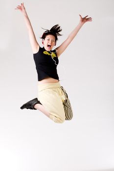Young girl enjoying the music and dance on it