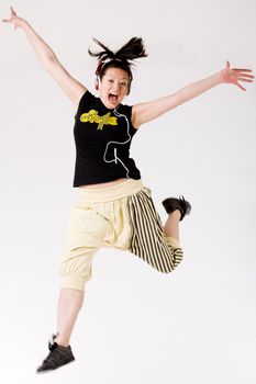 Young girl enjoying the music and dance on it
