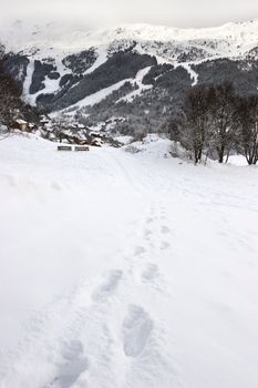Footprints in the snow leading to the viewpoint at Meribel ski resort, France