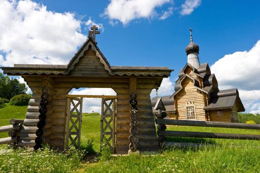 Open gate at russian wooden church