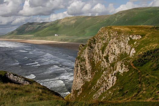 Rhossili Bay on the coast of the Gower peninsula in South Wales, UK.