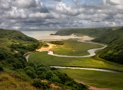 Three Cliff Bay on the Gower Peninsula, South Wales, UK, is a renowned beauty spot.