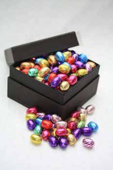 a black box filled with chocolate easter eggs