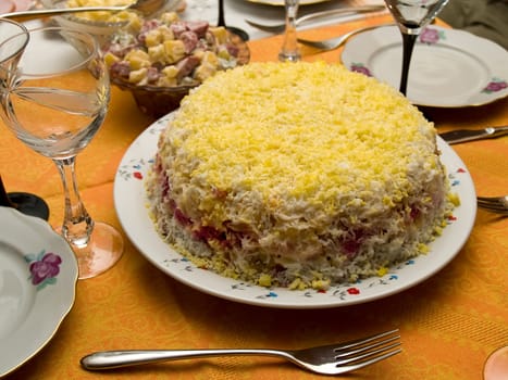 Table covered for a celebratory dinner. Tasty salad