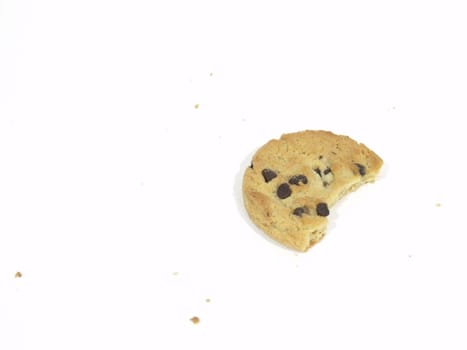 Isolated bitten chocolate chip cookie on a white background