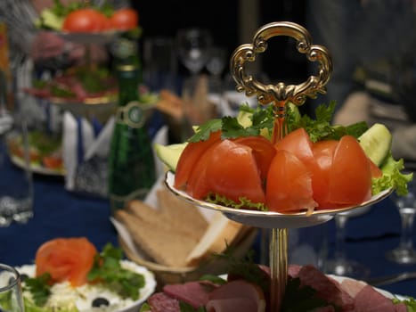 Tasty meal, salads, snack, drinks on a celebratory table