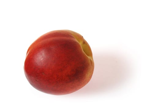 Tasty juicy nectarine on a white background with clipping mask. Shadows is not included in clipping mask