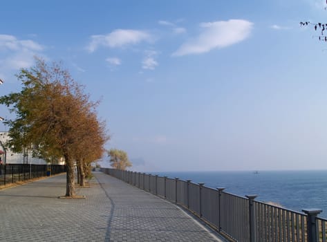 Peaceful beautiful place. Old quay in the coast of Black sea. Russia