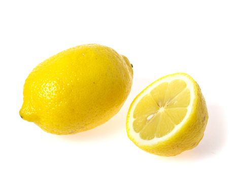 Photo of one lemon and half on white background