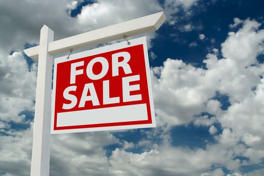 For Sale Real Estate Sign on Clouds &amp;amp; Sky Background.