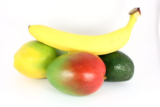 Tropical fruit, avocado, mango, papaya, banana, isolated on white