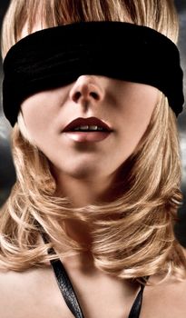 Closeup Of A  Beautiful Blond Woman Blindfolded