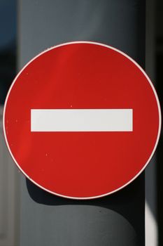 Photo Of A Forbidden Traffic Sign On Street Pillar