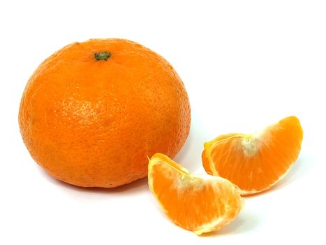 Isolated lobules of tangerine with clipping path. Shadow is not included with the clipping path.