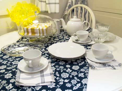 Table served to tea drinking. White tea service