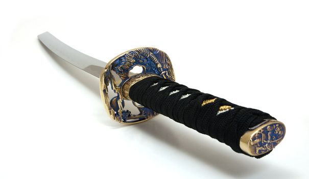 a sharpened decorative katana on a white background