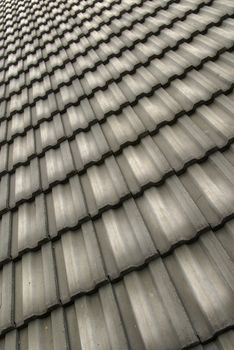 Abstract pattern of tile on roof of building.