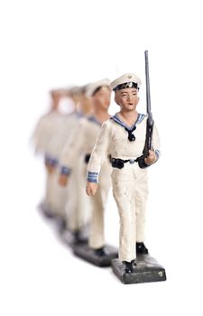 Marching Toy Soldiers Isolated on White Background