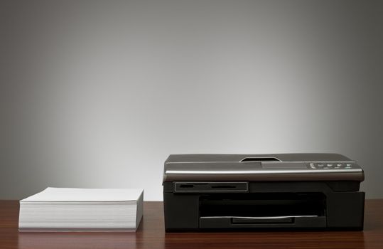 Copy Machine and a pile of papers in an office