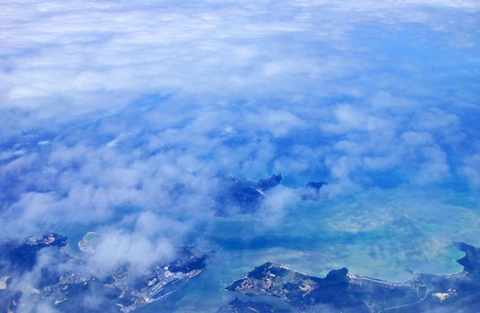 a top view from sky - island, sea, ocean