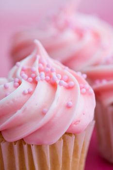 Closeup of pink cupcakes, very shallow depth of field