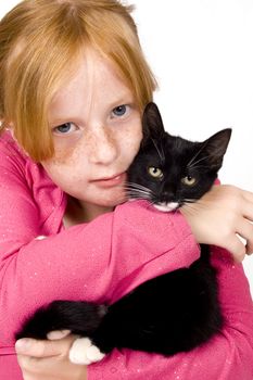 close up of girl and kitten