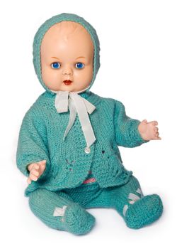 Old doll dressed in hand-knitted clothes, isolated against white