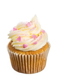 Cupcake decorated with frosting and pink sprinkles