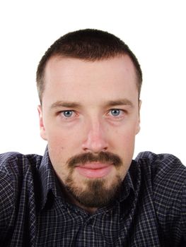 Young man portrait. Short hair, blue eyes, casual wear.