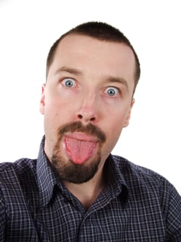 Adult man with bad manners - showing his tongue.