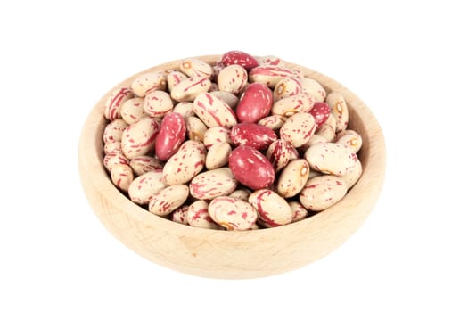 Beans in wooden bowl, isolated on white