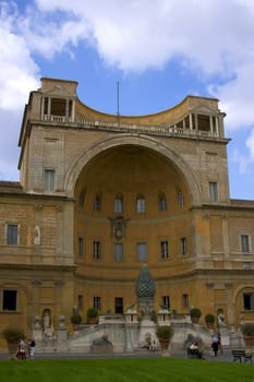 Vatican palace in Rome with green grass