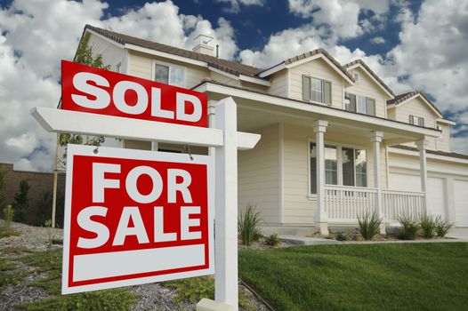 Sold Home For Sale Sign in Front of Beautiful New Home