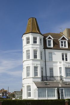 A victorian corner house with blue sky