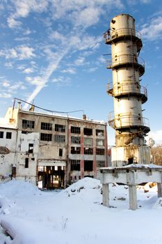 Old abandoned factory. Winter day a lot of white snow. Poland.