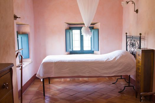 Rustic bedroom of a Tuscan farm house