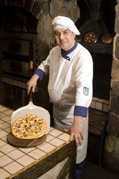 portrait of a chef in uniform.