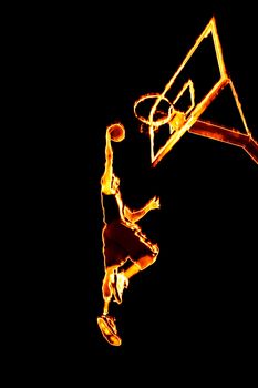 Abstract illustration of a fiery burning basketball player going up for a slam dunk.