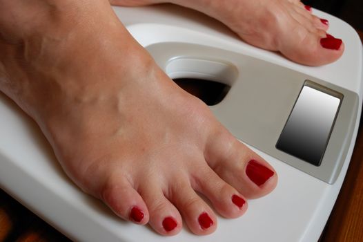 weigher and female feet