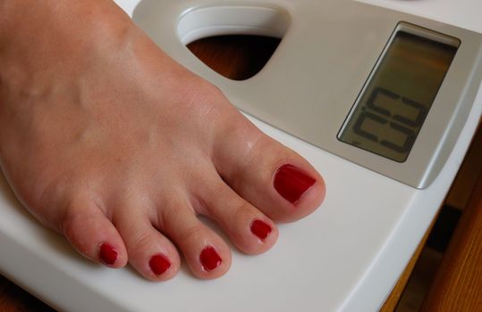 weigher and female foot