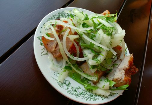 close-up of shish kebab served on table of cafe