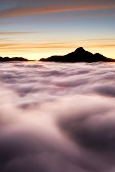 Dramatic landscape of mountain scenic with clouds in morning.