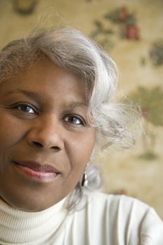 Portrait of mature African American woman looking at the viewer.