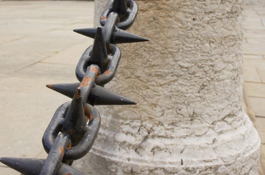 Close up of rusted spiked iron railings