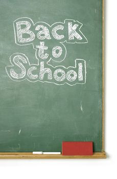 large XXL image of an old chalkboard with the phrase Back to school written on it